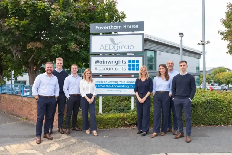 The Wainwrights Accountants team outside Faversham House in Bromborough