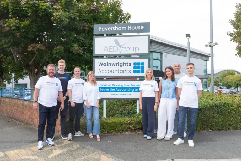The Wainwrights Accountants team outside Faversham House in Bromborough